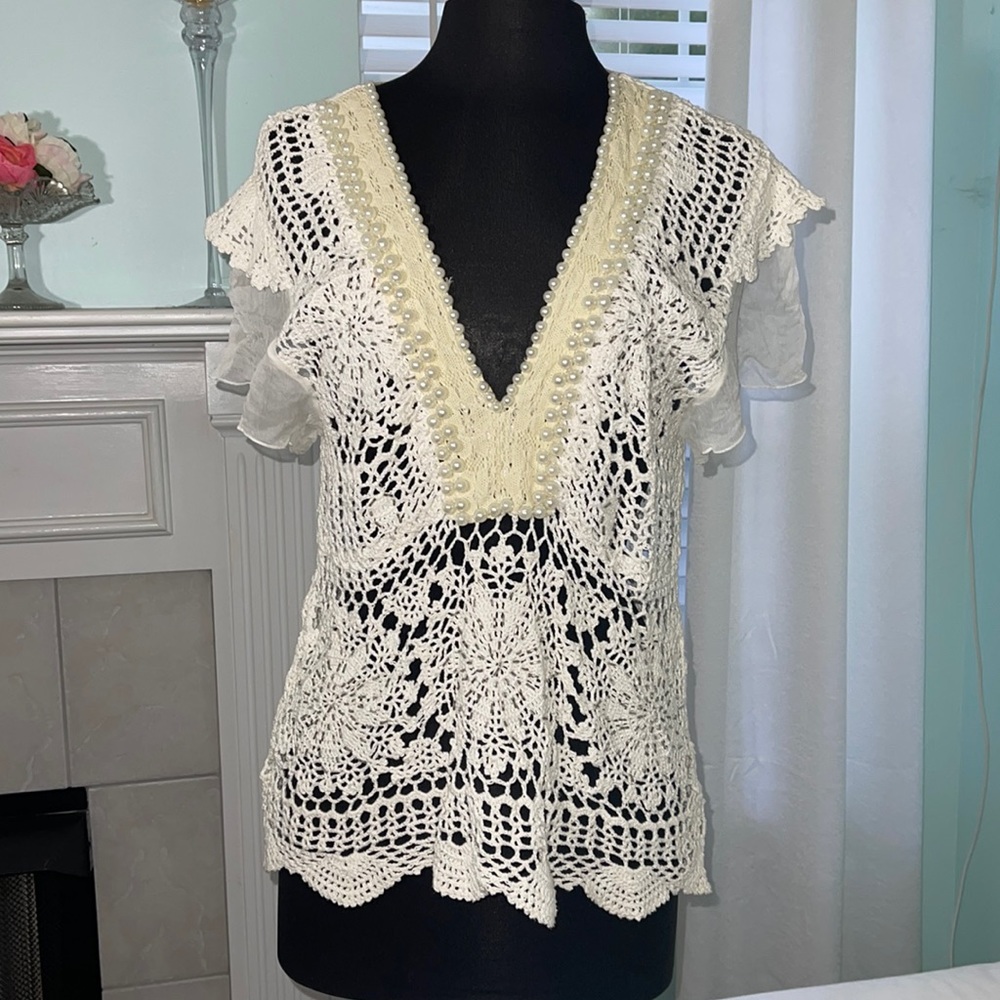 Crochet top with pearl bead V-neck detail. Size M